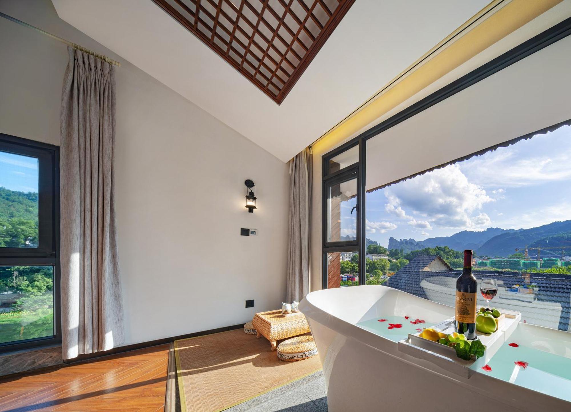 Hotel 張家界武陵源北岸輕奢客棧 森林公園店 Zhangjiajie Zewnętrze zdjęcie