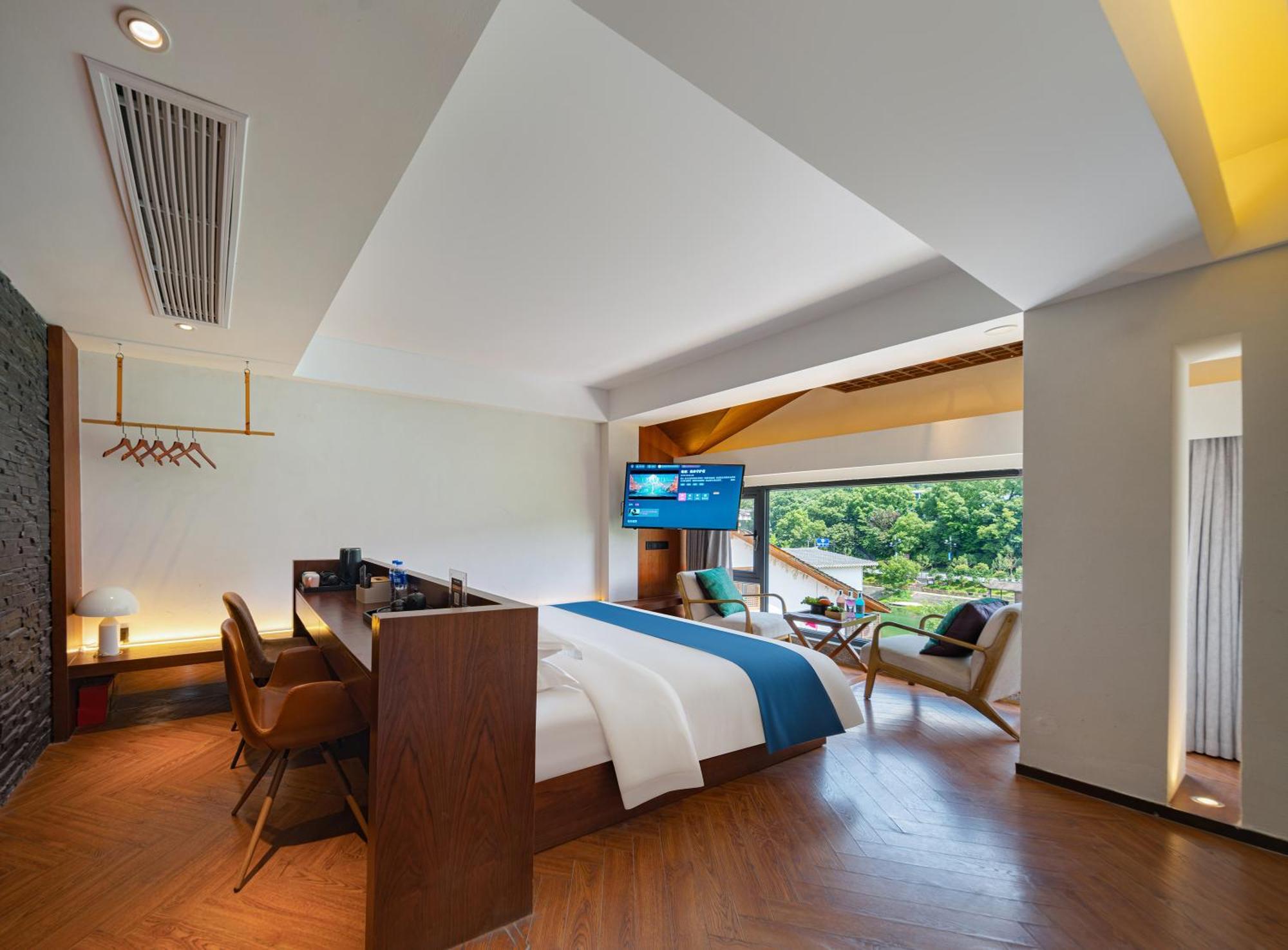 Hotel 張家界武陵源北岸輕奢客棧 森林公園店 Zhangjiajie Zewnętrze zdjęcie