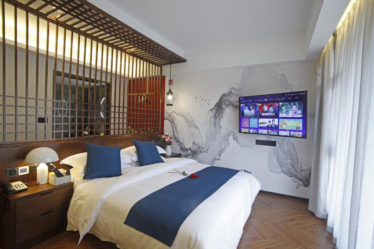 Hotel 張家界武陵源北岸輕奢客棧 森林公園店 Zhangjiajie Zewnętrze zdjęcie