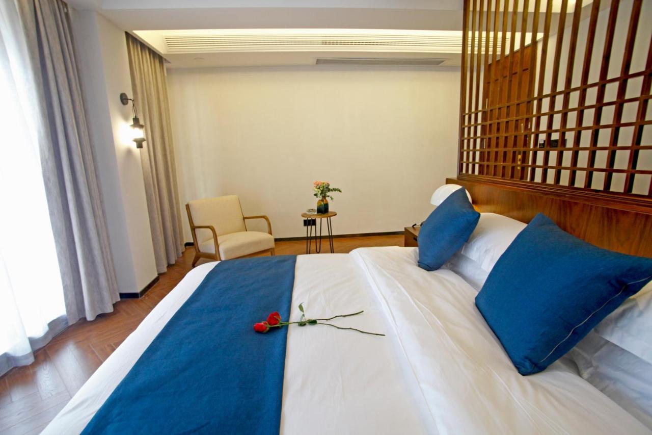 Hotel 張家界武陵源北岸輕奢客棧 森林公園店 Zhangjiajie Zewnętrze zdjęcie