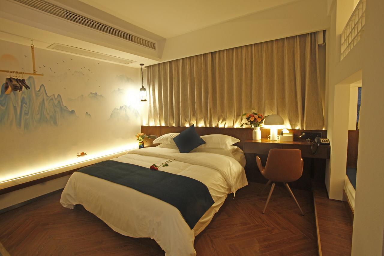 Hotel 張家界武陵源北岸輕奢客棧 森林公園店 Zhangjiajie Zewnętrze zdjęcie