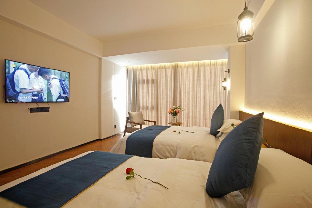 Hotel 張家界武陵源北岸輕奢客棧 森林公園店 Zhangjiajie Zewnętrze zdjęcie