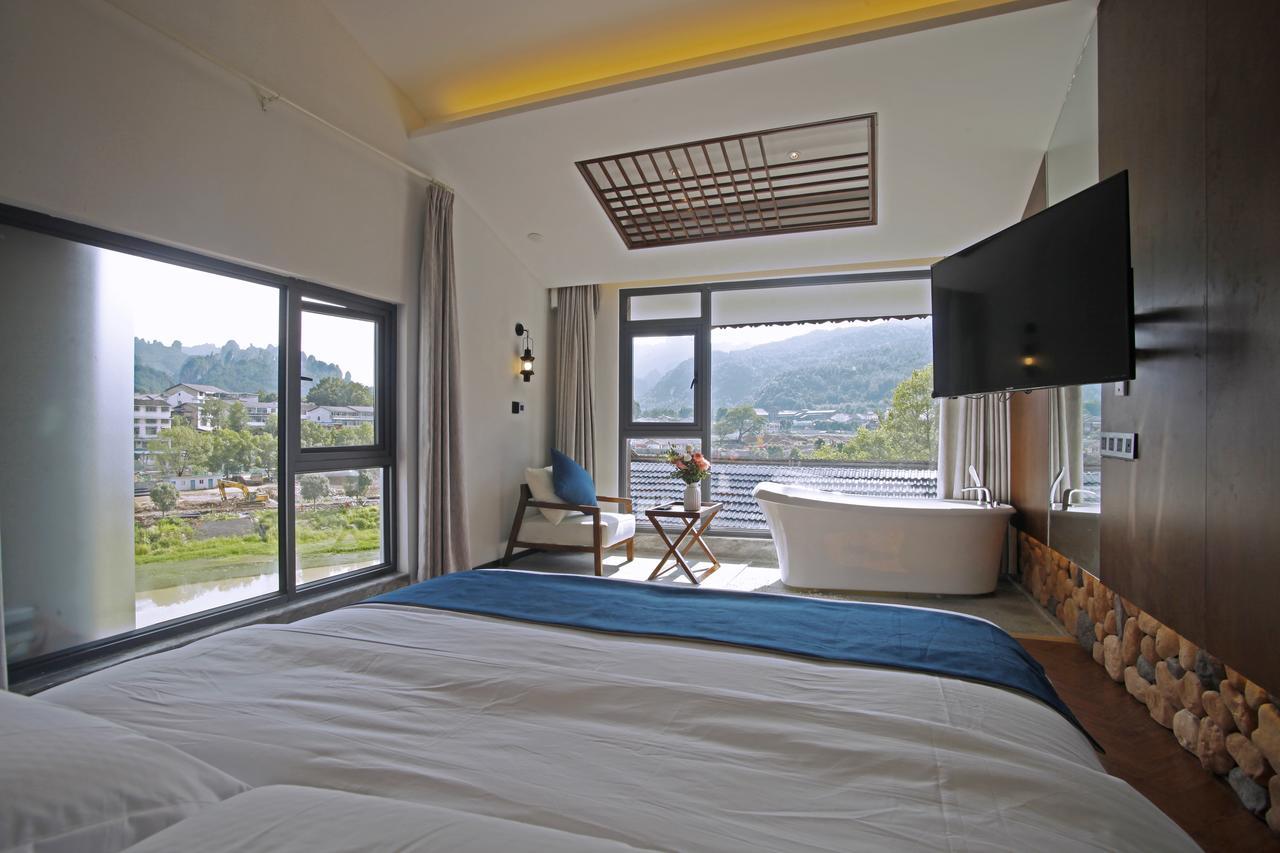 Hotel 張家界武陵源北岸輕奢客棧 森林公園店 Zhangjiajie Zewnętrze zdjęcie
